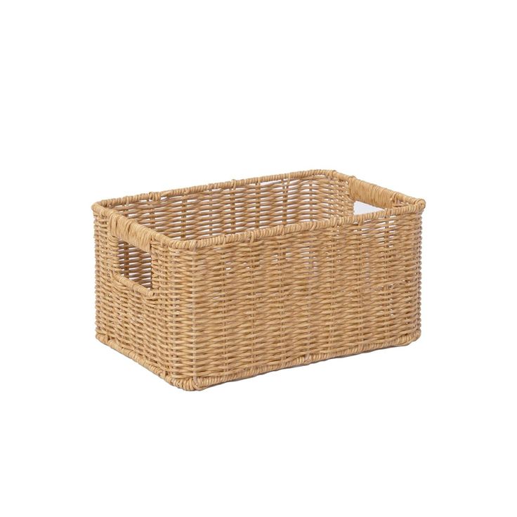 Woven rattan storage basket on a white background